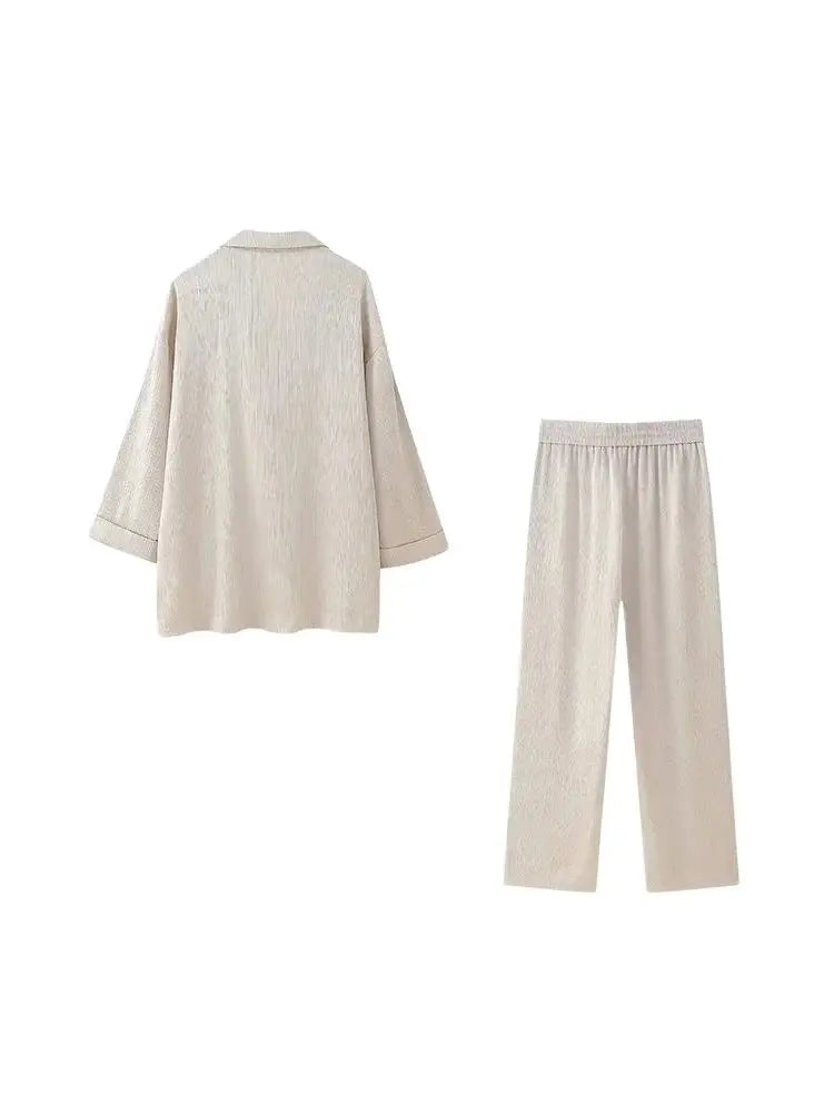 Elegant Women's Outfit – Long Coat & Wide Leg Trousers